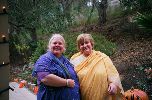 Maladhari Didi and Jashomati Didi, just after setting out the lanterns outside Srila Gurudev's house for his pleasure.