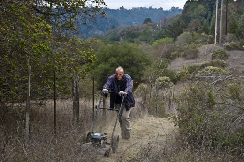 Krpa Sindhu prabhu, from Oregon, mowing the path to provide easier access.