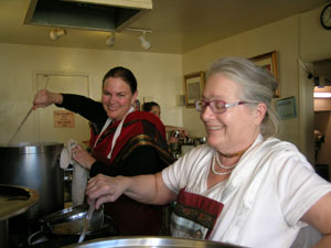 Meanwhile in the kitchen Sanatani and Sureshvari Didis are happily preparing a huge feast.