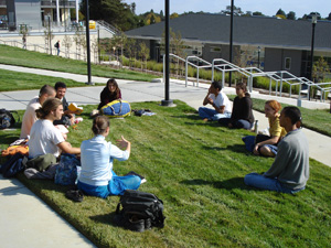 The first meeting of the Bhakti Yoga club of the new semester met on the grass outside the student building.