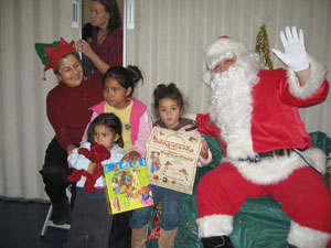 Santa Claus (Arindam Krishna Prabhu) is assisted by Kalindi Didi.