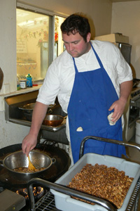 Vidura Krsna Prabhu preparing Aloo Baja and Chidwa.