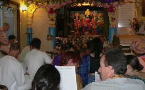 As the program goes on more and more devotees happily join in.