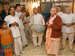 As the midnight hour arrives the devotees  engage in heartfelt kirtan.
