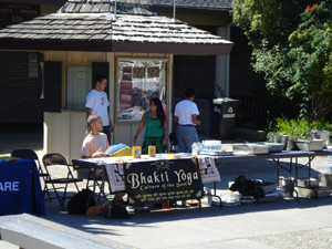 Our tables were set up outside in the middle of the Aptos campus quad. Dhruva Prabhu and Chitra  Devi Dasi, both students, came to help serve happily.