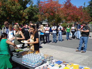 Our tables were set up outside in the middle of the Aptos campus quad. Dhruva Prabhu and Chitra  Devi Dasi, both students, came to help serve happily.