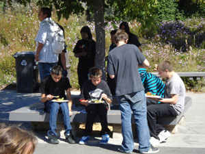 These young boys were very happy to taste the scrumptious lunch.