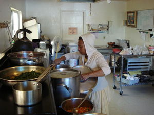 Divyasakti and Nalina Sundari Didis were cooking lunch on the first day of the distribution.