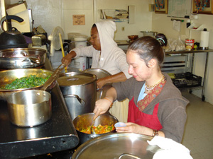 Divyasakti and Nalina Sundari Didis were cooking lunch on the first day of the distribution.