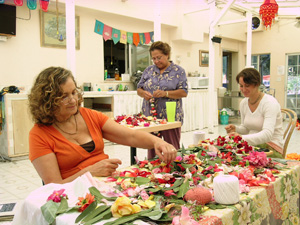 Rasangi, Diksavati and Nadiya Didis happily strung the many many garlands for decorating.