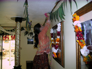 Meanwhile in the Temple room, Krishna Madhuri, Nalina Sundari and Diksavati Didis begin to design and hang the garlands.