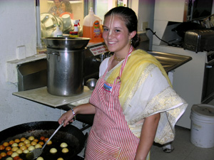 As the Temple receives the decorating seva the kitchen is also busy. Kumari Jahnavi makes her now famous Gulabjamins.