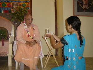 Sripad Janardan Maharaj gives Michelle her Japamala and explains how to chant and the ten offences to be avoided.