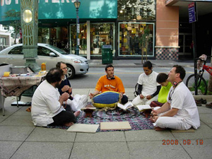 The enthusiasm grew and the seated bhajan became dancing kirtan. Passersby joined in.