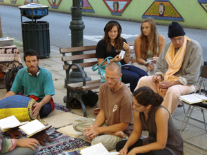 After two young girls were talking with Kamal Krsna,they sat down for a while to listen the kirtan.