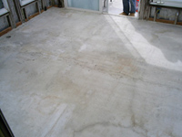 The old floor in Tulsi Devi's house as it is prepared for remodeling.