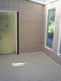 The newly finished ceramic tile walls and floor for Srimati Tulsi Devi