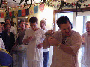   The temple room was filled to capacity and everyone joined in the kirtan with full enthusiasm.