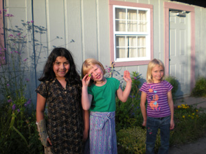 The children played in the sun. Here are Kumaris Radha Dasi, Syama Mohini and Anjali.