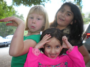 These happy young girls, Syama Mohini, Radha Dasi and Lavanica showed off for the camera.