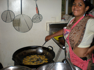 Vrinda Didi fries the okra pakoras.