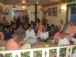 In the Temple room Sripad Janardan Maharaj leads a beautiful program.