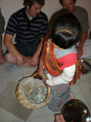 Young Sivani makes the rounds with the donation basket