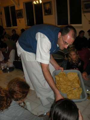 Giridhari Prabhu, our webmaster, serves the puris.