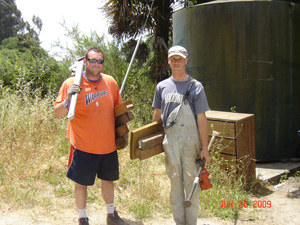 Vidura Krishna Prabhu and Giridhari Prabhu prepare to do some heavy duty clean up