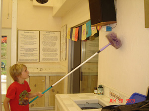 Young Gopal Prabhu, son of Murali Mohan Prabhu, came early and worked really hard to help clean the Prasad hall.