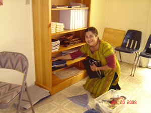 In the Temple room Kalindi Didi took on the bookshelf for the songbooks,