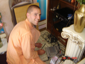 and Kamal Krishna Prabhu sorts through all kinds of sound equipment in and around the bookshelf.