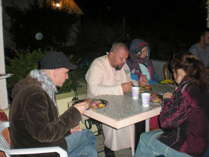 Outside, Avadhut Maharaj took Prasadam with some Russian guests from the Bay area.