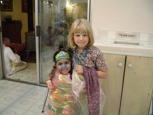 Dressed up for their part in the evening's play were young Sivani and Syama Mohini. 