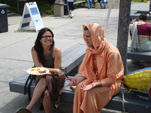 Kamal Krishna Prabhu talking with a interested teacher.