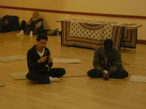 Adi Kesava Prabhu helps with the kirtan at the end of the talk.