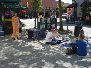 Our book table and kirttan set up downtown Santa Cruz on Pacific Ave.