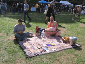 Rasaraj and Kamal Krishna Prabhus with our books and kirtan.