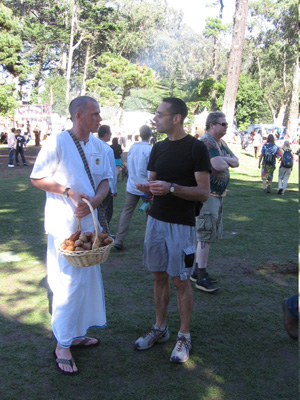 Bimal Krishna Prabhu distributes samosas and answers questions.