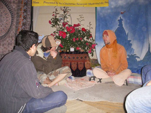 Kamal Krishna Prabhu preaching to some guests in front of our altar. 