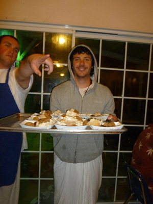 Nowla Kishora Prabhu under Vidura Krishnas guidance serves the dessert boats.