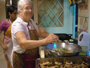 Sureshwari Didi always happy in the kitchen.