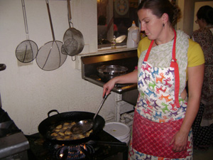 Radhika Didi fries samosas.