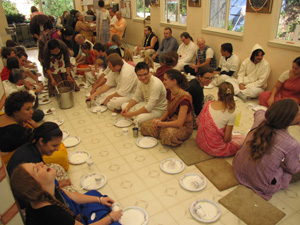 Everybody is happy to honor prasadam!