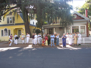 The devotees paid their respects from across the street.