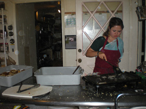 Sachi Didi takes over the frying of the many aloo tikkis.