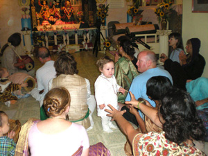 In the Temple room the bhajans and readings began early.