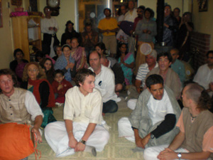 Kirtan starts again in the temple room.
