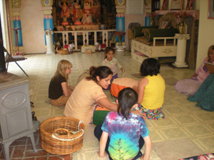 Dhanistha Devi Dasi gives a class on how to play the mrdanga.