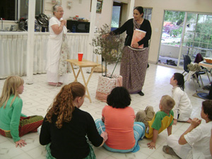 Krsna Priya Didi gives a class on the glories of  Srimati Tulasi Devi.